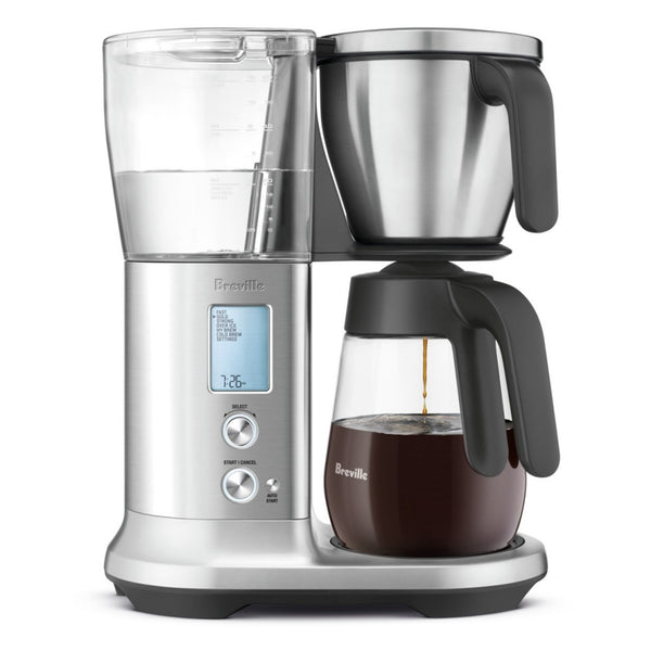 Breville Precision Brewer Coffee Machine with Glass Carafe full of brewing coffee
